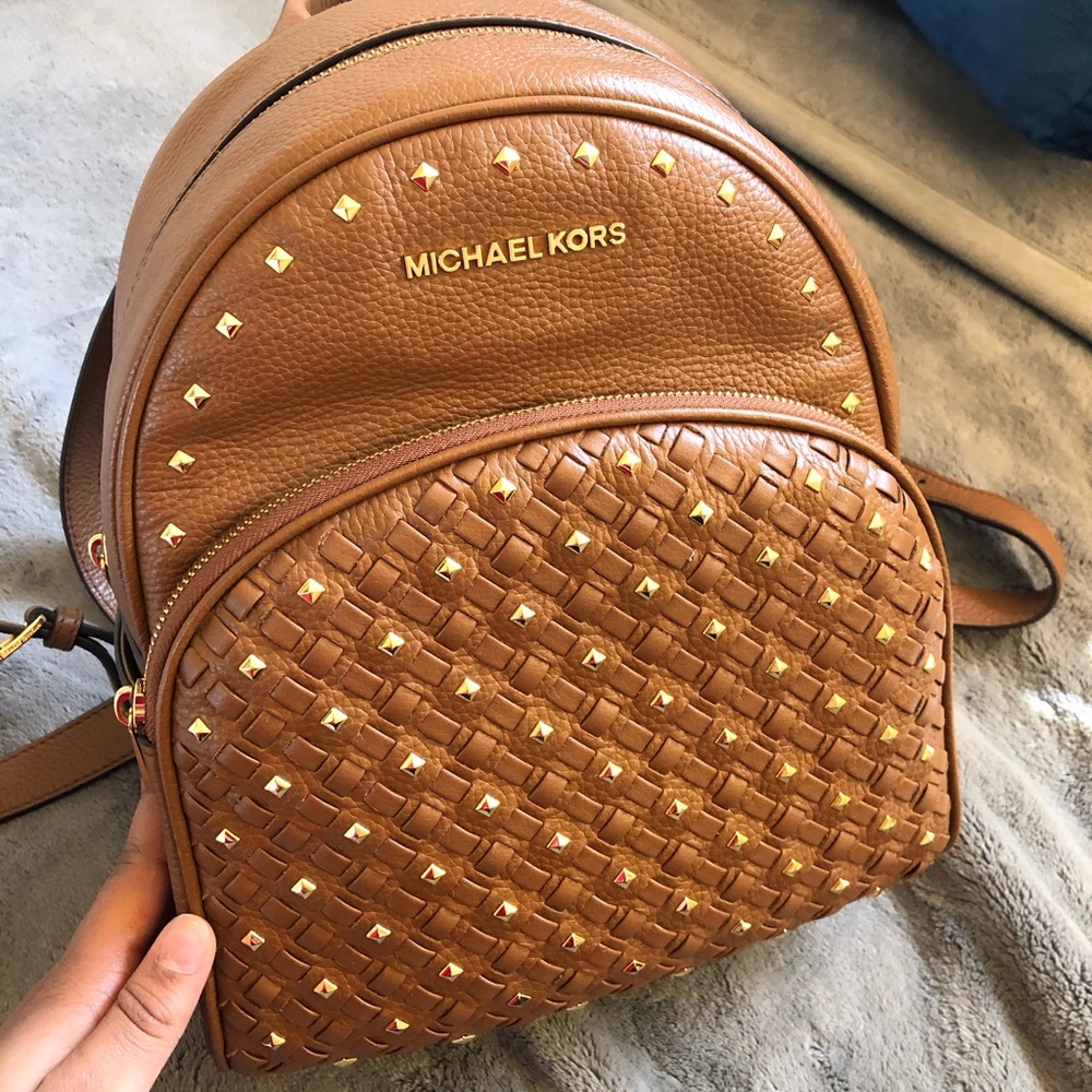 studded tan leather micheal kors backpack